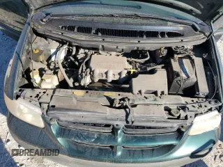 1996 Dodge Caravan z VIN 2B4GP2432TR624190, wystawiony jako Copart lot #77136974 z przebiegiem 172 721 mil mil oraz Czysty tytuł • Clean title. Historia ofert i sprzedaży dostępna na DreamBid. Obrazek 13.