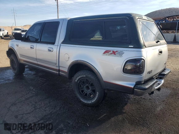 2002 Ford F-150 XLT with VIN 1FTRW08L12KA86849, listed as a Copart auction lot 77861574 with 0 mi miles and Salvage Title. Bid and sale history available at carsss.com. Image 2.