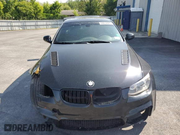 2012 BMW 3 Series 335i xDrive with VIN WBAKF9C52CE859145, listed as a Copart auction lot 59012885 with 80,023 mi miles and Salvage title. Bid and sale history available at DreamBid. Image 5.