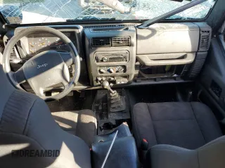 2004 Jeep Wrangler Rubicon with VIN 1J4FA69S74P785297, listed as a Copart auction lot 47332944 with 61,323 mi miles and Salvage Title. Bid and sale history available at carsss.com. Image 8.