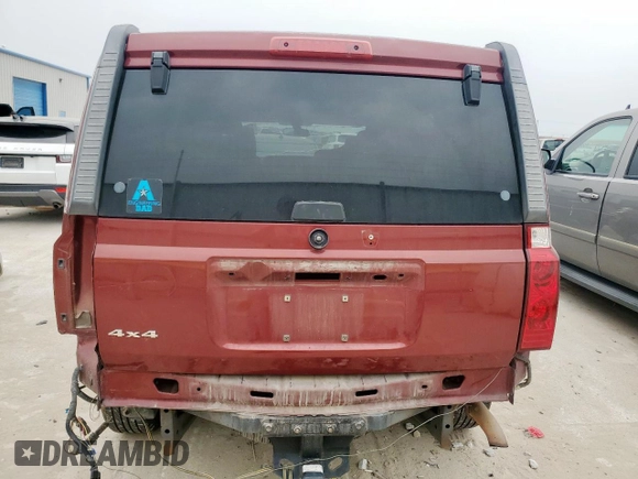 2007 Jeep Commander Sport z VIN 1J8HG48K27C697717, wystawiony jako Copart lot #53550395 z przebiegiem 288 452 mil mil oraz Szkoda całkowita • Salvage title. Historia ofert i sprzedaży dostępna na DreamBid. Obrazek 6.