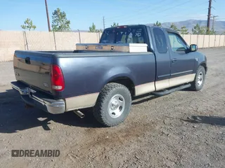 1999 Ford F-150 XL with VIN 1FTRX17L5XKB39130, listed as a IAAI auction lot 42041520 with Not Provided miles. Bid and sale history available at carsss.com. Image 4.