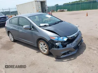2014 Honda Insight EX with VIN JHMZE2H74ES000924, listed as a IAAI auction lot 42511484 with 73,234 mi miles and . Bid and sale history available at DreamBid. Image 1.