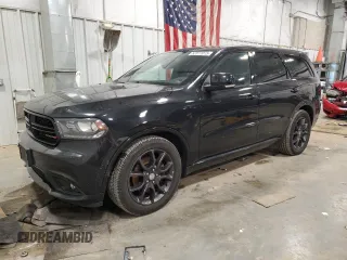 2016 Dodge Durango R/T with VIN 1C4SDJCTXGC409771, listed as a Copart auction lot 52077015 with 105,426 mi miles and Non Repairable. Bid and sale history available at DreamBid. Image 1.