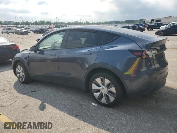2023 Tesla Model Y Long Range z VIN 7SAYGDEE2PA041350, wystawiony jako Copart lot #56657005 z przebiegiem 25 090 mil mil oraz Szkoda całkowita • Salvage title. Historia ofert i sprzedaży dostępna na DreamBid. Obrazek 2.