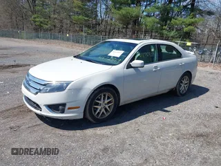 2011 Ford Fusion SEL with VIN 3FAHP0JG3BR160179, listed as a IAAI auction lot 41672819 with 164,195 mi miles and . Bid and sale history available at DreamBid. Image 2.