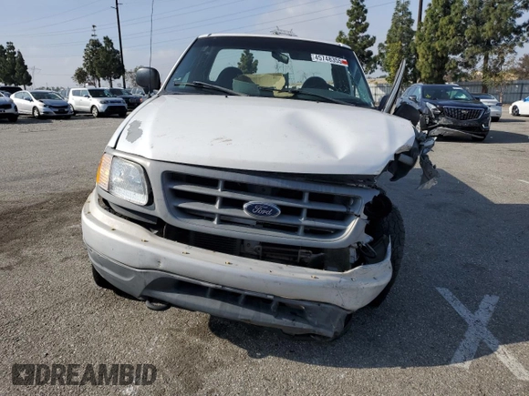 2000 Ford F-150 XL с VIN 1FTPF18L8YKA58312, выставлен на аукционе Copart как лот 45748355 с пробегом 200 263 миль миль и Списание • Salvage title. История ставок и продаж доступна на DreamBid. Изображение 5.