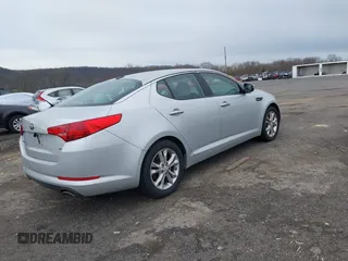 2013 Kia Optima LX with VIN 5XXGM4A74DG129353, listed as a IAAI auction lot 42035909 with 140,315 mi miles. Bid and sale history available at carsss.com. Image 4.
