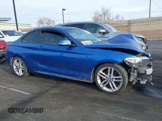 2015 BMW 2 Series 228i with VIN WBA1F5C59FVW98205, listed as a IAAI auction lot 41722804 with 91,879 mi miles. Bid and sale history available at carsss.com. Image 13.