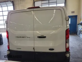 2018 Ford Transit with VIN 1FTYR1YG1JKB52228, listed as a IAAI auction lot 42832860 with 129,473 mi miles and . Bid and sale history available at DreamBid. Image 7.