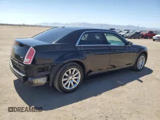 2014 Chrysler 300 with VIN 2C3CCAAG8EH307087, listed as a Copart auction lot 54091345 with 217,869 mi miles and Salvage Title. Bid and sale history available at DreamBid. Image 3.