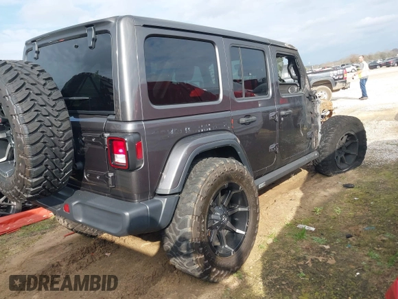 2019 Jeep Wrangler Unlimited Sahara with VIN 1C4HJXEG7KW661801, listed as a IAAI auction lot 40848731 with Not provided miles and . Bid and sale history available at DreamBid. Image 4.