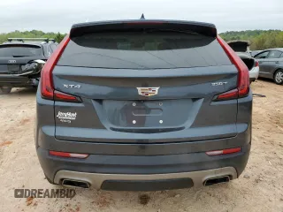 2021 Cadillac XT4 AWD Premium Luxury z VIN 1GYFZDR4XMF000937, wystawiony jako Copart lot #52406055 z przebiegiem 46 881 mil mil oraz Szkody całkowita. Historia ofert i sprzedaży dostępna na DreamBid. Obrazek 6.