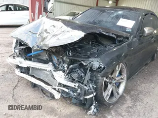 2018 BMW 5 Series M550i xDrive with VIN WBAJB9C51JB035949, listed as a IAAI auction lot 42085727 with Not provided miles and . Bid and sale history available at DreamBid. Image 6.