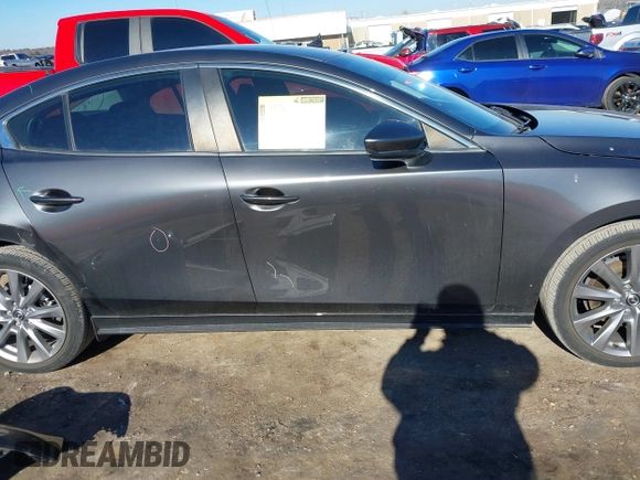 2021 Mazda 3 Select with VIN JM1BPBBL0M1329224, listed as a IAAI auction lot 41348699 with 12,338 mi miles and . Bid and sale history available at carsss.com. Image 14.