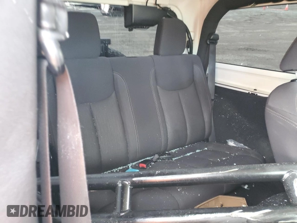 2013 Jeep Wrangler Sahara z VIN 1C4AJWBG7DL512437, wystawiony jako Copart lot #48928325 z przebiegiem Nie podano mil oraz Szkoda całkowita • Salvage title. Historia ofert i sprzedaży dostępna na DreamBid. Obrazek 11.