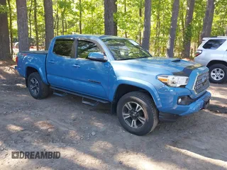 2019 Toyota Tacoma SR z VIN 3TMCZ5AN5KM263854, wystawiony jako IAAI lot #42112868 z przebiegiem 65 545 mil mil oraz . Historia ofert i sprzedaży dostępna na DreamBid. Obrazek 1.