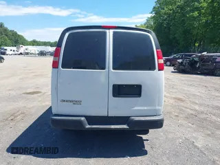 2014 Chevrolet Express Cargo Van with VIN 1GCWGFCA2E1210307, listed as a IAAI auction lot 39559260 with 213,814 mi miles. Bid and sale history available at carsss.com. Image 16.