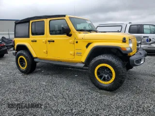 2019 Jeep Wrangler Unlimited Sahara with VIN 1C4HJXEN2KW523906, listed as a Copart auction lot 50950035 with 98,013 mi miles and Salvage Title. Bid and sale history available at carsss.com. Image 4.