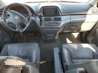 2007 Honda Odyssey EX-L z VIN 5FNRL38647B028078, wystawiony jako Copart lot #56208005 z przebiegiem 192 000 mil mil oraz Szkoda całkowita • Salvage title. Historia ofert i sprzedaży dostępna na DreamBid. Obrazek 8.