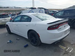 2018 Dodge Charger SXT Plus with VIN 2C3CDXHG4JH187580, listed as a IAAI auction lot 42024602 with 203,843 mi miles and . Bid and sale history available at carsss.com. Image 3.