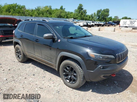 2019 Jeep Cherokee Trailhawk Elite with VIN 1C4PJMBN6KD275525, listed as a Copart auction lot 60636145 with 93,872 mi miles and Salvage title. Bid and sale history available at DreamBid. Image 4.