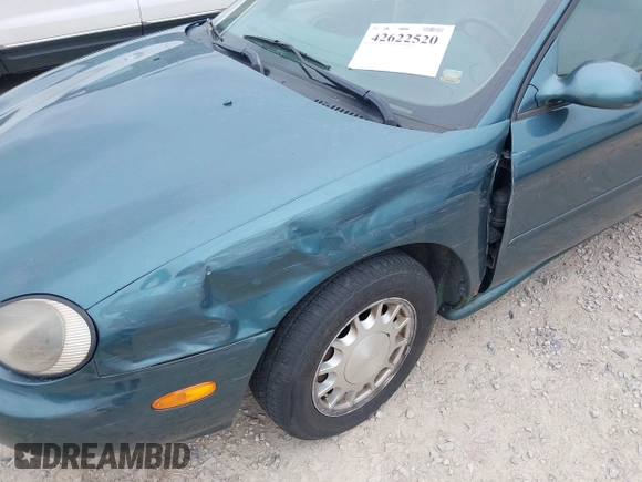 1996 Ford Taurus LX with VIN 1FALP53S3TG177324, listed as a IAAI auction lot 42622520 with 126,979 mi miles and . Bid and sale history available at DreamBid. Image 6.