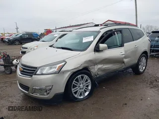 2015 Chevrolet Traverse LT with VIN 1GNKRGKDXFJ241842, listed as a IAAI auction lot 41009812 with 149,158 mi miles. Bid and sale history available at carsss.com. Image 2.