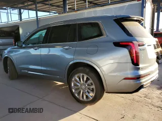 2025 Cadillac XT6 AWD Premium Luxury z VIN 1GYKPDRS6SZ100046, wystawiony jako Copart lot #42248355 z przebiegiem 2293 mil mil oraz Szkody całkowita. Historia ofert i sprzedaży dostępna na DreamBid. Obrazek 2.