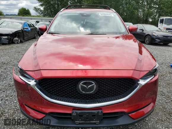 2019 Mazda CX-5 Grand Touring with VIN JM3KFBDM2K0639247, listed as a Copart auction lot 64060045 with 69,563 mi miles and Salvage title. Bid and sale history available at DreamBid. Image 5.