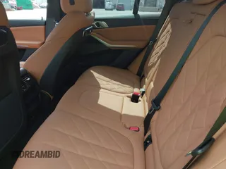2025 BMW X5 xDrive40i with VIN 5UX23EU08S9Z12797, listed as a IAAI auction lot 42781495 with 7,393 mi miles and . Bid and sale history available at DreamBid. Image 8.