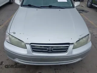 2001 Toyota Camry LE z VIN 4T1BF28K71U127407, wystawiony jako IAAI lot #42247606 z przebiegiem 289 995 mil mil oraz . Historia ofert i sprzedaży dostępna na DreamBid. Obrazek 12.