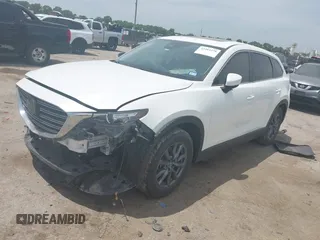 2021 Mazda CX-9 Touring with VIN JM3TCACY9M0526376, listed as a IAAI auction lot 42264478 with 74,671 mi miles and . Bid and sale history available at DreamBid. Image 17.