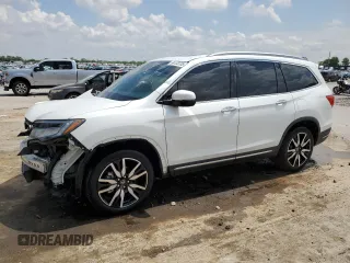 2021 Honda Pilot Touring 7-Passenger z VIN 5FNYF6H68MB077008, wystawiony jako Copart lot #54133735 z przebiegiem 96 052 mil mil oraz Szkoda całkowita • Salvage title. Historia ofert i sprzedaży dostępna na DreamBid. Obrazek 1.
