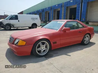 1994 Mercedes-Benz SL 5.0L z VIN WDBFA67E6RF092705, wystawiony jako Copart lot #60880965 z przebiegiem 96 690 mil mil oraz Czysty tytuł • Clean title. Historia ofert i sprzedaży dostępna na DreamBid. Obrazek 1.