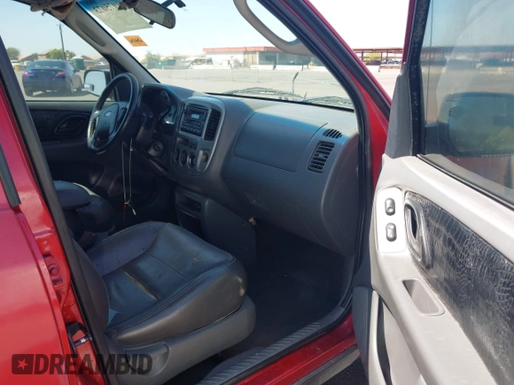 2003 Ford Escape XLT Popular 2 with VIN 1FMYU93123KB02310, listed as a IAAI auction lot 41975073 with 169,864 mi miles. Bid and sale history available at carsss.com. Image 5.