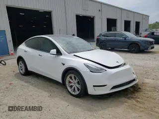 2021 Tesla Model Y Long Range with VIN 5YJYGDEE5MF203130, listed as a Copart auction lot 54642795 with 73,663 mi miles and Non Repairable. Bid and sale history available at DreamBid. Image 14.