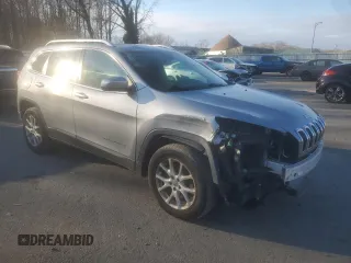 2015 Jeep Cherokee North with VIN 1C4PJMCS3FW600663, listed as a Copart auction lot 82230624 with 143,121 mi miles and Salvage Title. Bid and sale history available at carsss.com. Image 4.