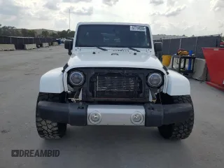 2013 Jeep Wrangler Unlimited Sahara with VIN 1C4BJWEG4DL536694, listed as a Copart auction lot 57714035 with 146,257 mi miles and Salvage title. Bid and sale history available at DreamBid. Image 5.