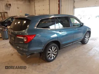 2021 Honda Pilot EX-L z VIN 5FNYF6H54MB082455, wystawiony jako IAAI lot #42343787 z przebiegiem 25 954 mil mil oraz . Historia ofert i sprzedaży dostępna na DreamBid. Obrazek 4.