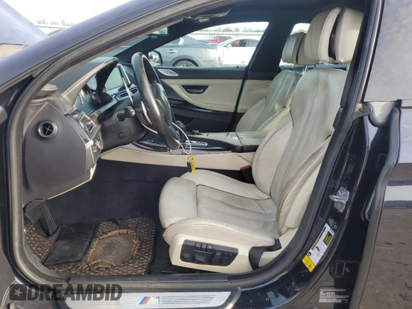 2014 BMW 6 Series 650i z VIN WBA6B2C51ED128896, wystawiony jako Copart lot #84801734 z przebiegiem 142 181 mil mil oraz Szkoda całkowita • Salvage title. Historia ofert i sprzedaży dostępna na DreamBid. Obrazek 7.