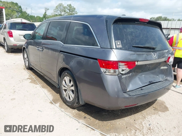 2014 Honda Odyssey EX-L with VIN 5FNRL5H69EB075115, listed as a IAAI auction lot 42046386 with 200,340 mi miles and . Bid and sale history available at carsss.com. Image 3.