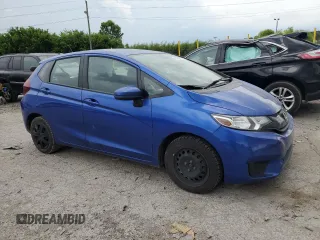 2017 Honda Fit LX with VIN 3HGGK5H55HM703996, listed as a Copart auction lot 61653735 with 77,028 mi miles and Salvage title. Bid and sale history available at DreamBid. Image 4.