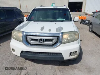 2011 Honda Pilot EX-L with VIN 5FNYF4H56BB037809, listed as a IAAI auction lot 42143553 with 230,873 mi miles. Bid and sale history available at carsss.com. Image 12.