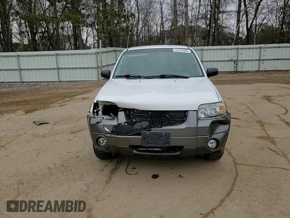 2006 Ford Escape XLT with VIN 1FMCU03106KC14923, listed as a Copart auction lot 52727095 with 126,842 mi miles and Salvage Title. Bid and sale history available at DreamBid. Image 11.
