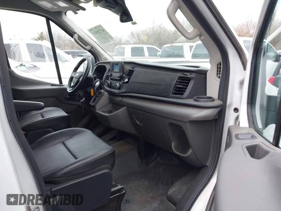 2023 Ford Transit Cargo z VIN 1FTBF4U80PKA47025, wystawiony jako IAAI lot #41715521 z przebiegiem 104 952 mil mil oraz . Historia ofert i sprzedaży dostępna na DreamBid. Obrazek 5.