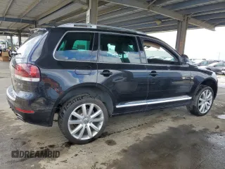 2010 Volkswagen Touareg VR6 with VIN WVGBF7A98AD001321, listed as a Copart auction lot 48949685 with 101,944 mi miles and Salvage Title. Bid and sale history available at DreamBid. Image 3.
