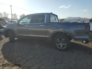 2022 Honda Ridgeline RTL-E with VIN 5FPYK3F71NB027341, listed as a Copart auction lot 49859415 with 38,477 mi miles and Salvage Title. Bid and sale history available at carsss.com. Image 2.