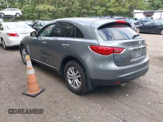 2014 Infiniti QX70 with VIN JN8CS1MW9EM413406, listed as a IAAI auction lot 40269302 with 123,957 mi miles and . Bid and sale history available at DreamBid. Image 3.
