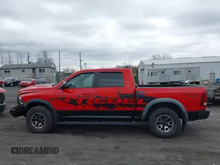 2016 Ram 1500 Rebel z VIN 1C6RR7YT3GS307866, wystawiony jako IAAI lot #42008912 z przebiegiem 65 556 mil mil oraz . Historia ofert i sprzedaży dostępna na DreamBid. Obrazek 14.